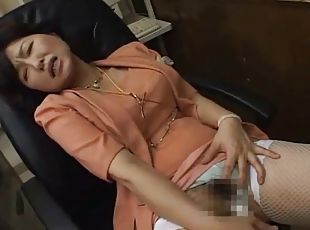 Japanese milf teacher masturbating in the office