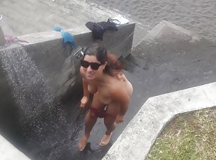 A Curvy Girl Gets Completely Changed And Takes Naked A Shower Outdoors On The Beach
