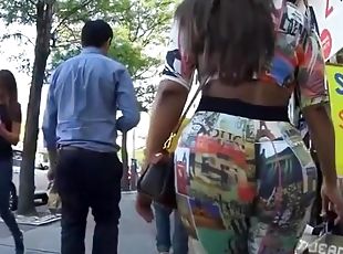 Big ass latin chick wearing tight colorful clothes