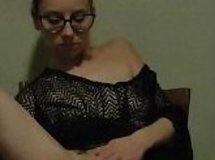 Masturbating with favorite dildo in fishnet poncho