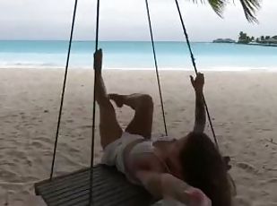 Hot Olesya Malibu swings on a swing in the Maldives