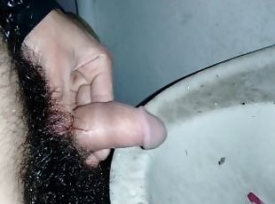 releasing my piss/ around the toilet