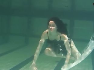 Dressed Up Teen Irina Barna Swims Sexy In The Pool