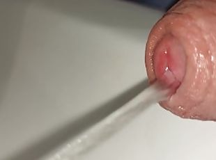 closeup foreskin while peeing