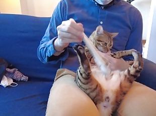 The pussy being massaged is in full view .................. Looks very pleasant.