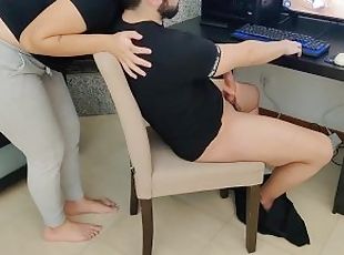 mature step-mom gives her stepson a handjob while watching porn
