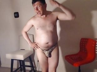 This Sexy Guy Talks Porn and His Channel in A Snake Skin Thong!