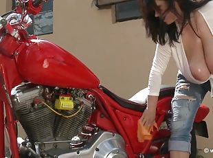 Bike washing - Brunette mature biker with monster jugs teasing topless outdoors