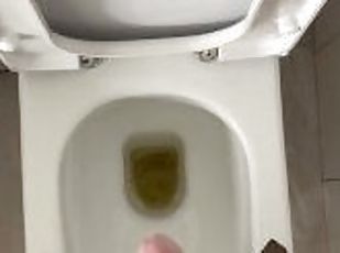 POV British guy pissing in the toilet