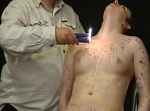 Lean body covered in dripping hot wax