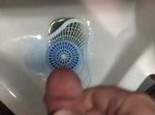 horny hairy trucker masturbates into truck stop urinal