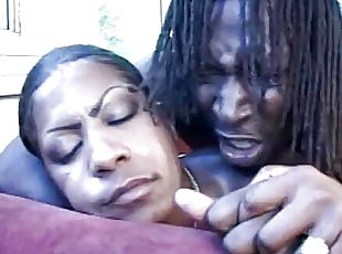 Black babe with alarge ass blows a fat black cock and gets her pussy pounded 
