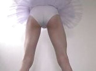 sissy ballerina showing off flexibility