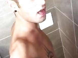 Waterpark Twink is pissing at the urinal with fat dick