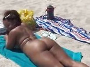 Gataofficialtwerk at the beach in a Tiny Micro Bikini