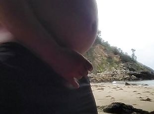 Masturbating on the beach